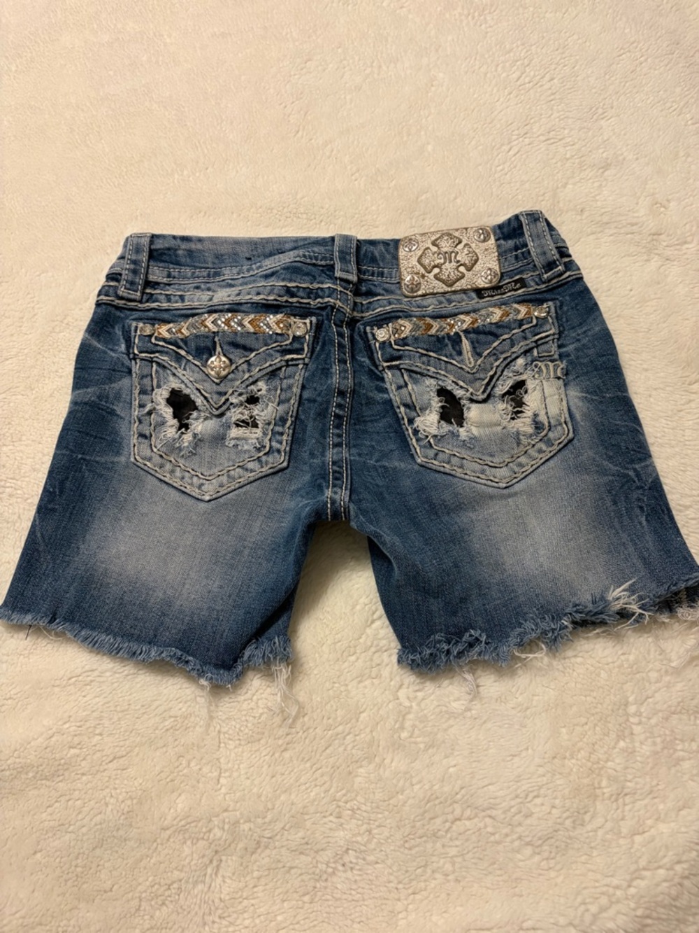 Miss Me Distressed Denim Cutoff Shorts in Blue